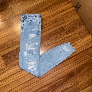 American Eagle By Payless Light Blue Ripped Skinny Jeans